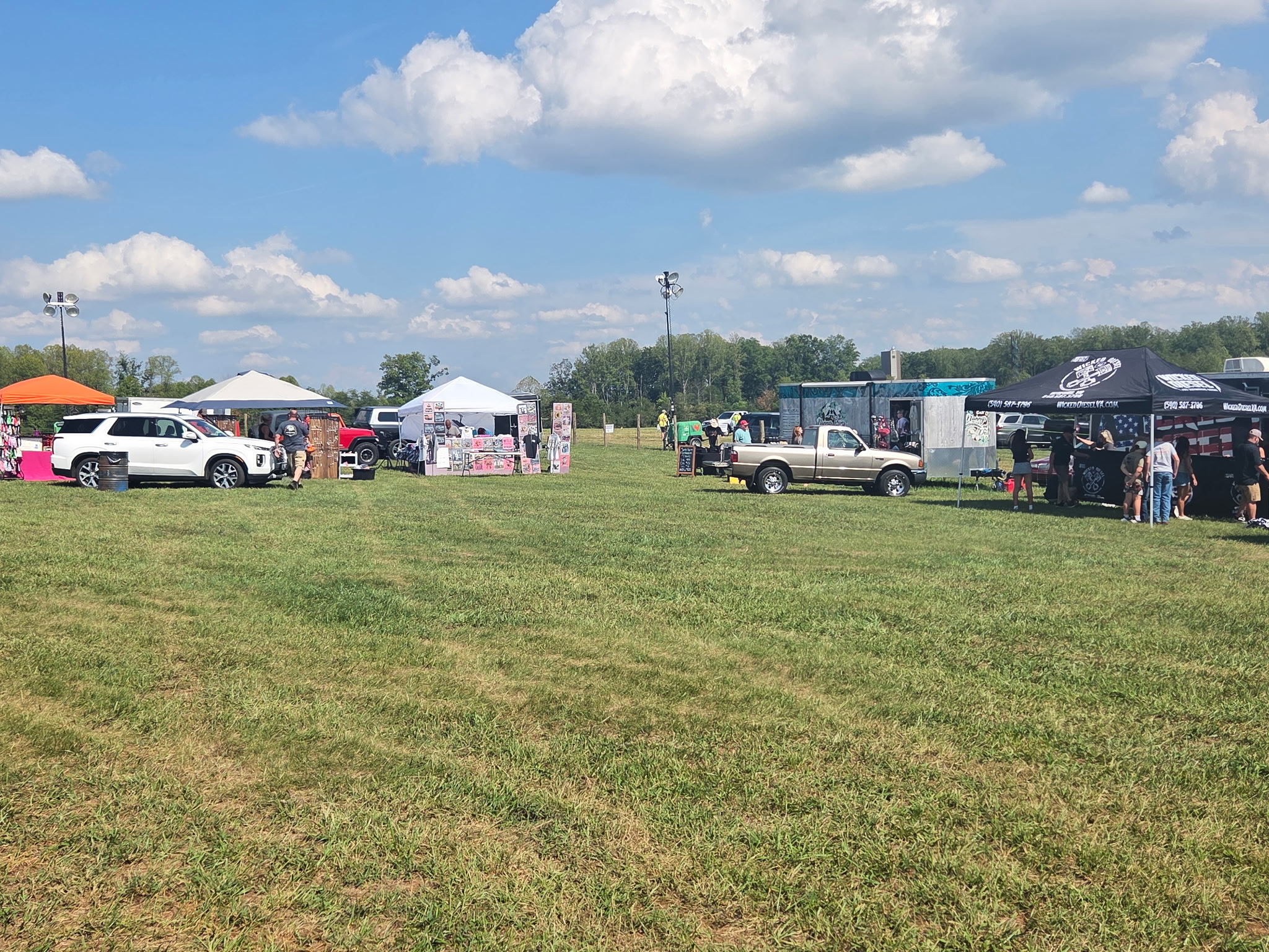 Wide view of event vendors at Sims Farm